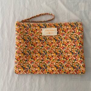 New Tory Burch Shiseido zip orange floral clutch